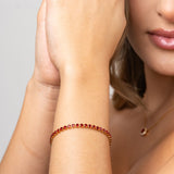 Pulsera Tenis Roja en Oro laminado 18k