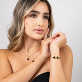 Pulsera Vc Negra en Oro laminado 18k