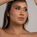 Combo Cadena Eslabón + Dije Corazón Silueta + Arete Trilogia  en Oro laminado 18k para Dama