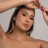 Combo Cadena Eslabón + Dije Corazón Silueta + Arete Trilogia  en Oro laminado 18k para Dama