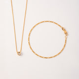 Combo Cadena Corazón Cristal + Pulsera Fígaro en Oro laminado 18k para Dama