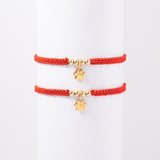 Pulsera Huellita en Oro laminado 18k, Hilo Rojo o Negro Para Pareja
